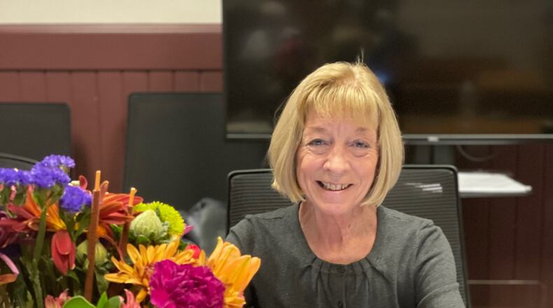 Mary Ann Eaton was congratulated on her retirement as the city’s Clerk of Council at her final regular meeting Nov. 16. She was presented with this flower arrangement and a mayoral proclamation recognizing her last day on the job, Nov. 30, as Mary Ann Eaton Day in the City of Oxford. CONTRIBUTED