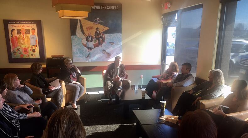 Lakota Schools Superintendent Matt Miller - far center - holds one of his recent coffee chats with school parents and residents of the Butler County district. The regularly scheduled, informal meetings are a point of emphasis for the school system’s new school leader.