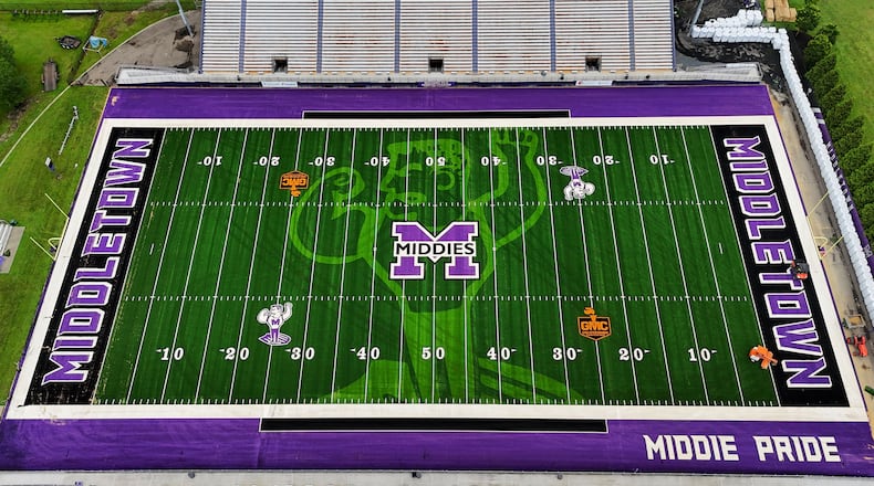 There is more to the newly installed football field at Middletown Schools’ Barnitz Stadium beyond some of the most visually striking graphics among all the southwest Ohio’s Greater Miami Conference (GMC) prep sports stadiums.
Below the surface, there is now an extra layer of padded safety for the city school system’s premier sports stadium, said Middletown school officials. (Photo By Nick Graham/Journal-News)