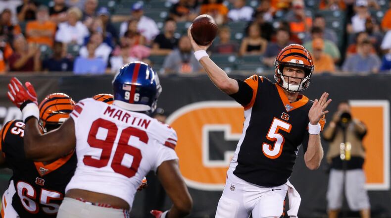 Cincinnati Bengals quarterback Ryan Finley (5) throws during the first half of an NFL preseason football game against the New York Giants, Thursday, Aug. 22, 2019, in Cincinnati. (AP Photo/Frank Victores)