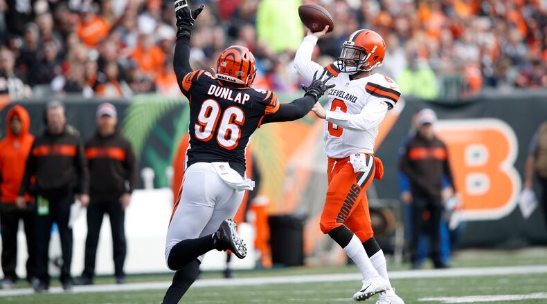 CINCINNATI, OH - NOVEMBER 25:  Carlos Dunlap #96 of the Cincinnati Bengals pressures Baker Mayfield #6 of the Cleveland Browns during the second quarter at Paul Brown Stadium on November 25, 2018 in Cincinnati, Ohio. (Photo by Joe Robbins/Getty Images)