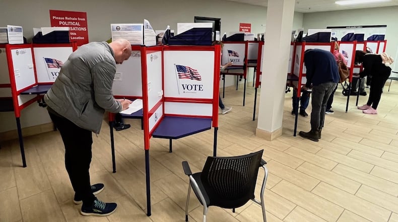 Voters cast early ballots in-person at the Warren County Board of Elections office on Friday, Nov. 3, 2023. ED RICHTER / STAFF