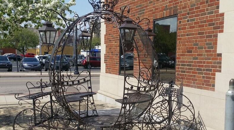 High school students from Butler Tech's welding program recently completed a full-size, fairy tale carriage for a downtown Hamilton events center. The public art, which is on display in front of the Benison Events and Coworking facility, is the latest public project for the award-winning career learning program. (Provided Photo\Journal-News)