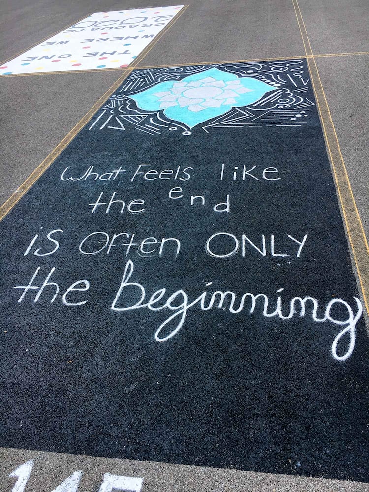 PHOTOS Lakota East seniors paint parking spots