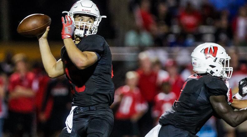Lakota West quarterback Mitch Bolden and the Firebirds beat Colerain on Friday night at Colerain. NICK GRAHAM/STAFF FILE