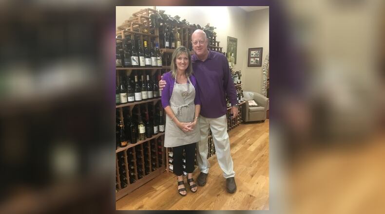 Melanie Cedargren (pictured with her husband, Ted) owns The Spicy Olive, which is celebrating its five-year anniversary with the opening of The Wine Cellar at the West Chester store. CONTRIBUTED
