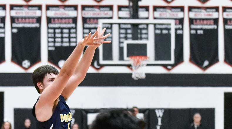 Monroe’s Nick Osterman puts up a shot during a game at Franklin on Jan. 26, 2018. The host Wildcats won 55-52. NICK GRAHAM/STAFF
