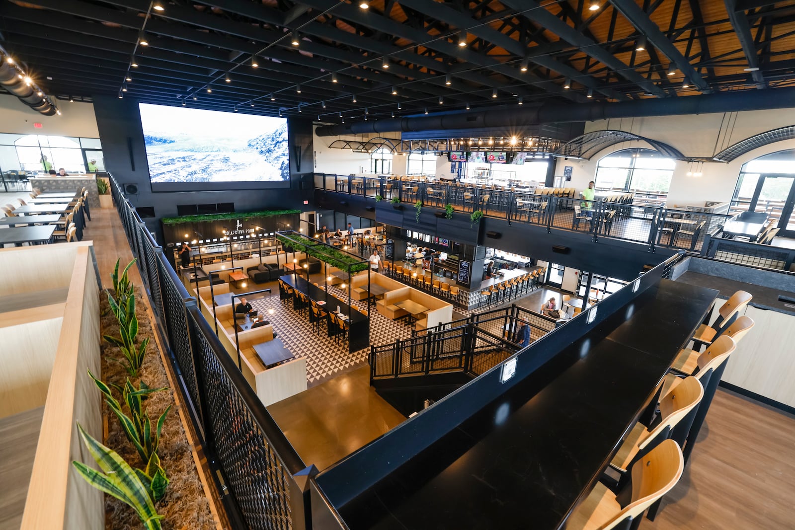 Liberty Collective is set to open on Lakota Lane in Liberty Township. Liberty Collective is a multi-entertainment complex that features five restaurant concepts, a coffee/breakfast bar, an ice cream shop, three bars including a wine/bourbon bar. outdoor seating, covered patios, sand sports courts for volleyball, a huge LED screen and more. NICK GRAHAM/STAFF