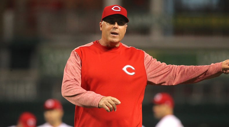Reds manager Bryan Price goes into spring training with a competitive group of starting pitchers. DAVID JABLONSKI / STAFF