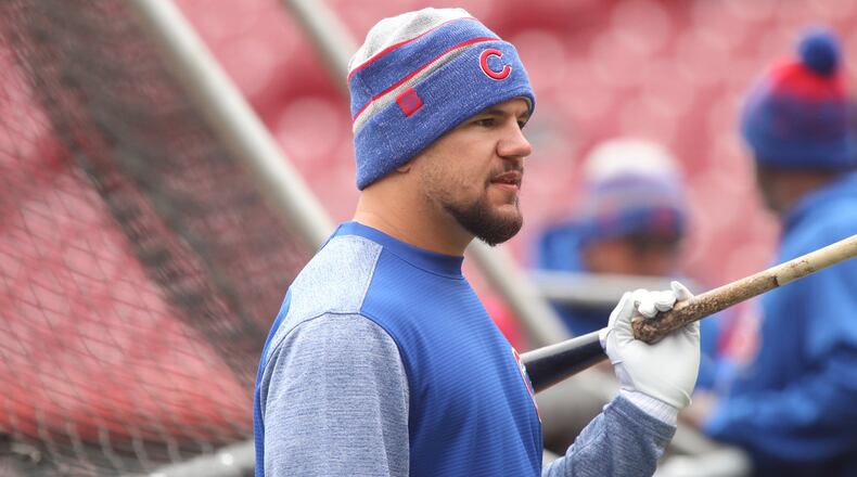 The Cubs’ Kyle Schwarber prepares to take batting practice before a game against the Reds on Monday, April 2, 2018, at Great American Ball Park in Cincinnati. David Jablonski/staff