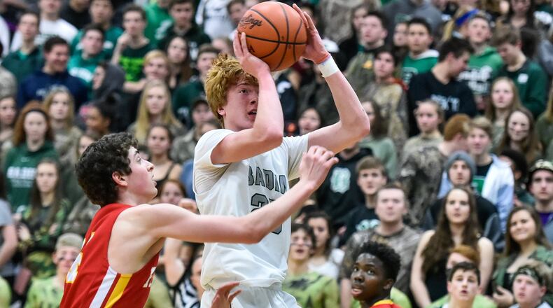 Badin’s Zach Switzer puts up a shot defended by Fenwick’s Nick Braun during their game Jan. 19, 2018, at Mulcahey Gym in Hamilton. Fenwick won 61-56 in overtime. NICK GRAHAM/STAFF