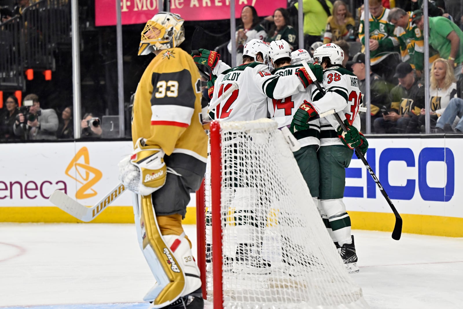 The Minnesota Wild celebrate a goal by left wing Kirill Kaprizov against the Vegas Golden Knights during the first period of Game 5 of a first-round NHL hockey playoff series Tuesday, April 29, 2025, in Las Vegas. (AP Photo/David Becker)
