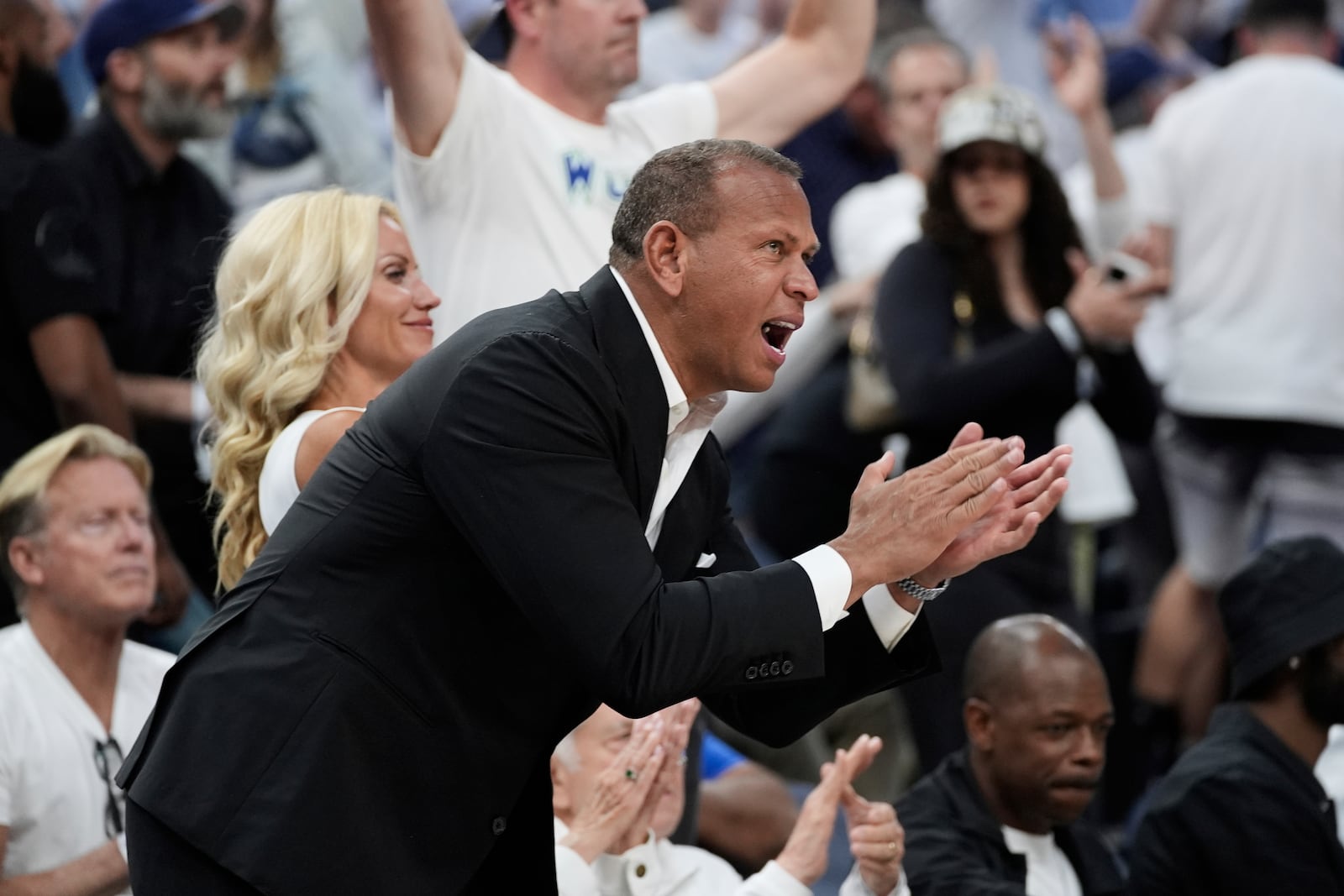 Minnesota Timberwolves co-owner Alex Rodriguez cheers during the second half of Game 4 of the Western Conference finals of the NBA basketball playoffs between the Timberwolves and the Oklahoma City Thunder Monday, May 26, 2025, in Minneapolis. (AP Photo/Abbie Parr)
