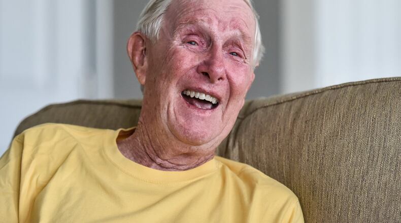 Chuck Hedges, a father of five, suffered a debilitating stroke last year that left him unable to walk or lift his head. After rehabilitation at Atrium Medical Center, Hedges is able to walk again. He said he is thankful for his family as he celebrates another Father’s Day. NICK GRAHAM/STAFF