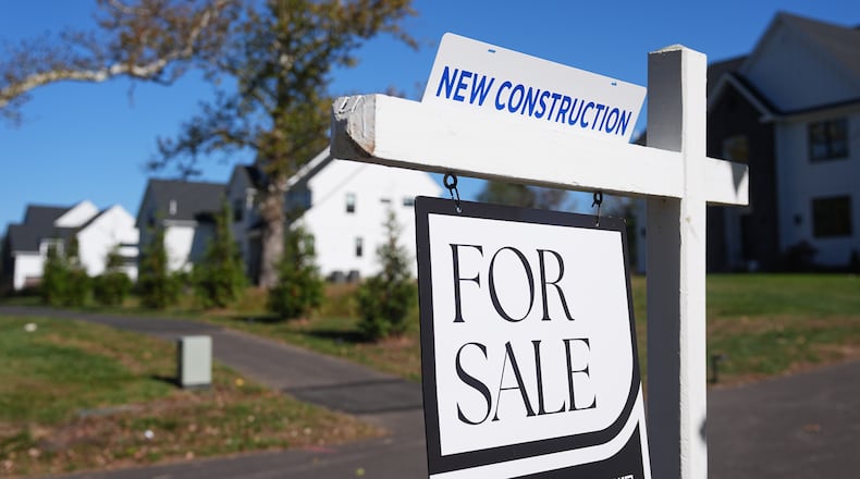 FILE - A sign is posted for a new home for sale in Ambler, Pa., Thursday, Oct. 16, 2025. (AP Photo/Matt Rourke, File)