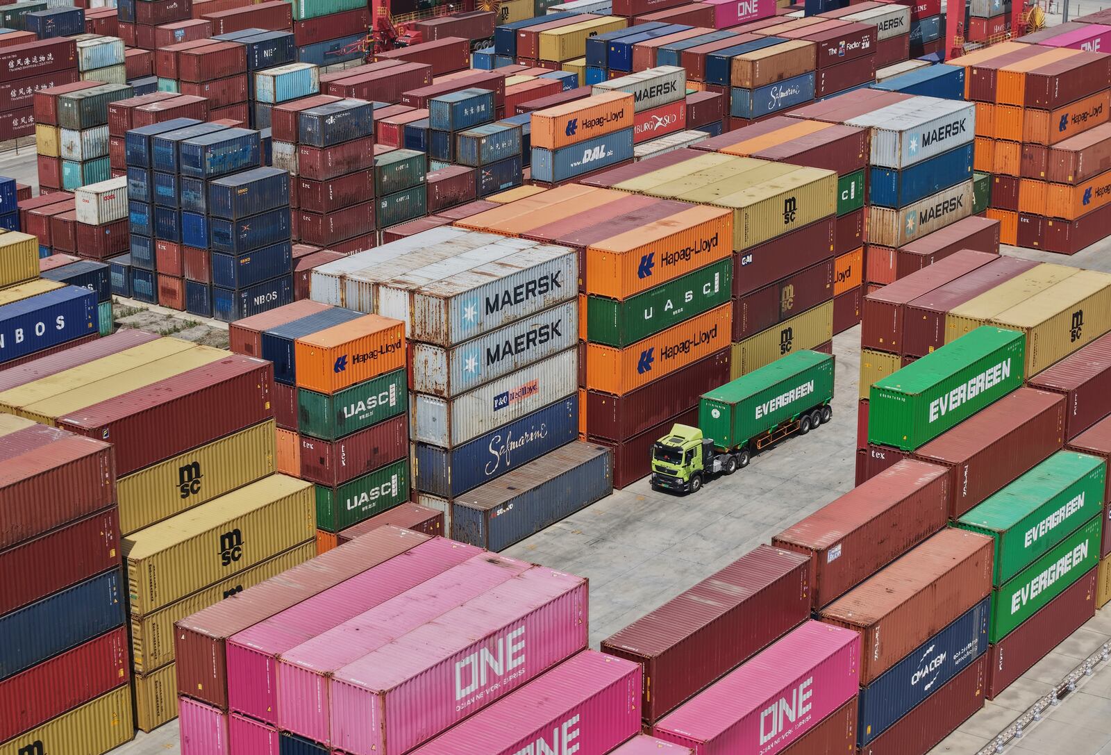 An aerial view of Xiasha Container Terminal on a canal in Hangzhou in east China's Zhejiang province Sunday, April 6, 2025. (Chinatopix Via AP)
