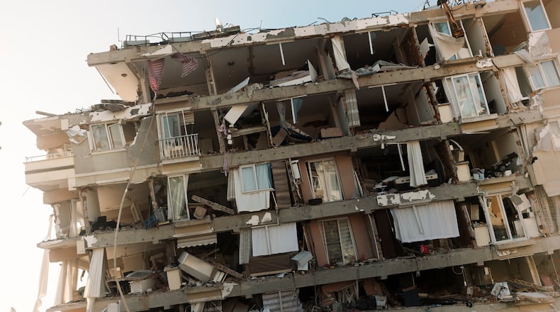 A destroyed apartment complex is cleared in Antakya, the capital of Hatay Province, Turkey on Friday, Feb. 10, 2023. The death toll in Turkey and Syria from this week’s catastrophic earthquake surpassed 23,600 on Friday as relief organizations struggled to overcome an array of obstacles to deliver aid to survivors in both countries. (Emily Garthwaite/The New York Times)
