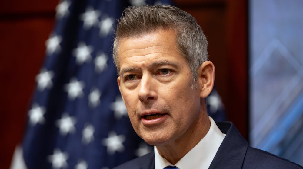 Transportation Secretary Sean Duffy speaks during a news conference at the Department of Transportation in Washington, Friday, Dec. 12, 2025. (AP Photo/Mark Schiefelbein)