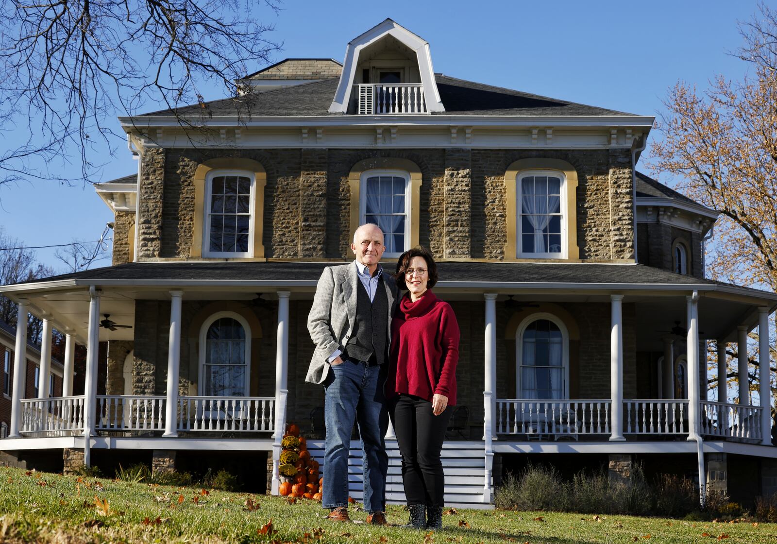 Tim and Kristan MacDonald stand on the property they are renovating that was formerly Butler County Children’s Home on S. D street in Hamilton. 

Tim MacDonald started The Father's House with his first wife, Doreen, whose idea it was to help foster children. She later passed away and he was living elsewhere. But when MacDonald's current wife, Kristan, learned there was a need for someone to oversee the facility, she urged him to move back to Hamilton to help with that, and they did. Area foster children, who face struggles other kids don't, will benefit. NICK GRAHAM / STAFF