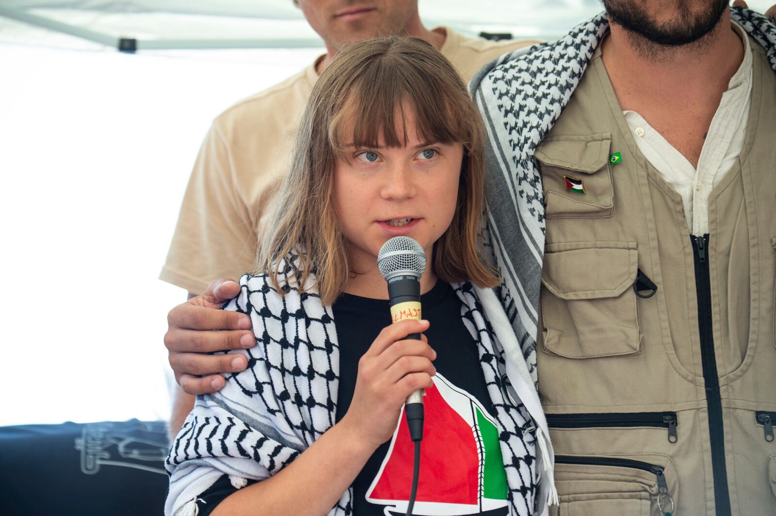 Climate activist Greta Thunberg with other activists from a human rights organization meets with journalists in Catania, Italy, Sunday, June 1, 2025, ahead of their departure for the Mideast. (AP Photo/Salvatore Cavalli)