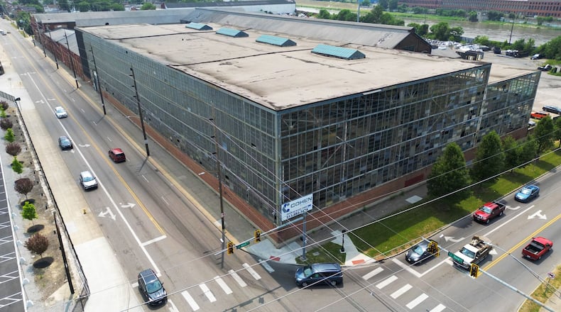 It was announced late Wednesday that Hamilton is considering a development agreement with Dublin-based Crawford Hoying that includes a $3 million forgivable loan to redevelop the Cohen Recycling plant. Crawford Hoying is planning a three-phase project that will invest a minimum of $150 million to construct a new mixed-use development that includes retail space, a hotel, apartments, and townhomes. NICK GRAHAM/STAFF