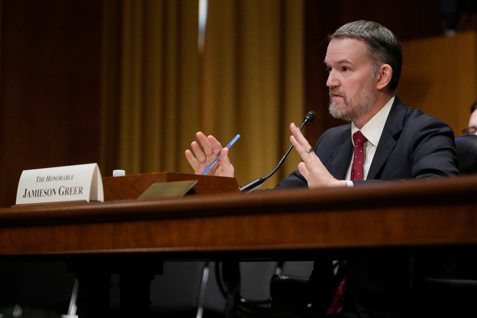 U.S. Trade Representative Jamieson Greer testifies before the Senate Finance Committee on Capitol Hill in Washington, Tuesday, April 8, 2025. (AP Photo/Mark Schiefelbein)