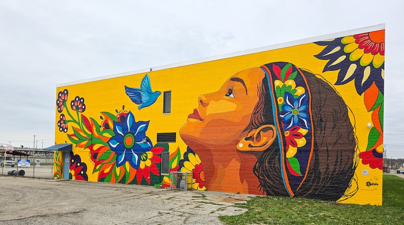 "Viva el Sueño (Live the Dream)" is painted across the eastern wall of Hamilton Living Water Ministry, 510 S. Eighth St., in the city's Jefferson neighborhood. The mural by artist Anna Ganina of Austin, Texas was unveiled in 2025. Launched in Hamilton in 2016 as a partnership between the Fitton Center for Creative Arts, the City of Hamilton and the Hamilton Community Foundation, StreetSpark aims to enhance the city’s creative identity through murals and public art. NICK GRAHAM/STAFF
