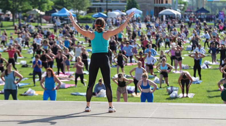 The Beauty Boost Cincy will host its 11th fitness sampler at the conference center at Spooky Nook Sports Champion Mill this September. The fitness sampler, which saw 1,400 women participate at the May event in Blue Ash, will be limited to 750 as it makes a first-time showing in Hamilton. The Cincy Fitness Sampler will showcase six workouts for women of all fitness levels, 75 complimentary wellness experiences and an opportunity to connect with a large network of Greater Cincinnati women. Pictured is a scene from a previous Cincy Fitness Sampler. PROVIDED/ALLISON DARLING PHOTOGRAPHY