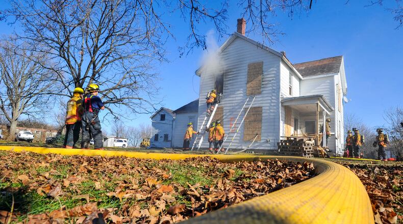 Smoke and fire response part of Liberty and West Chester training The Liberty and West Chester township fire departments, along with some Sharonville firefighters, used a donated house for a joint live fire training at the corner of Liberty Way and Cox Road Wednesday, Dec. 20. Signs were up along Liberty Way warning drivers of the training. NICK GRAHAM/STAFF