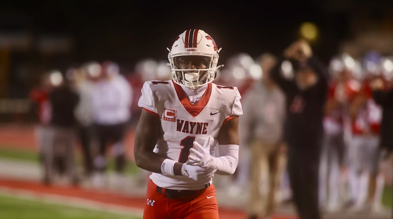 Wayne's Jamier Brown lines up for a play during a game against Troy in a Division I, Region 2 semifinal on Friday, Nov. 14, 2025, at Troy Memorial Stadium. David Jablonski/Staff