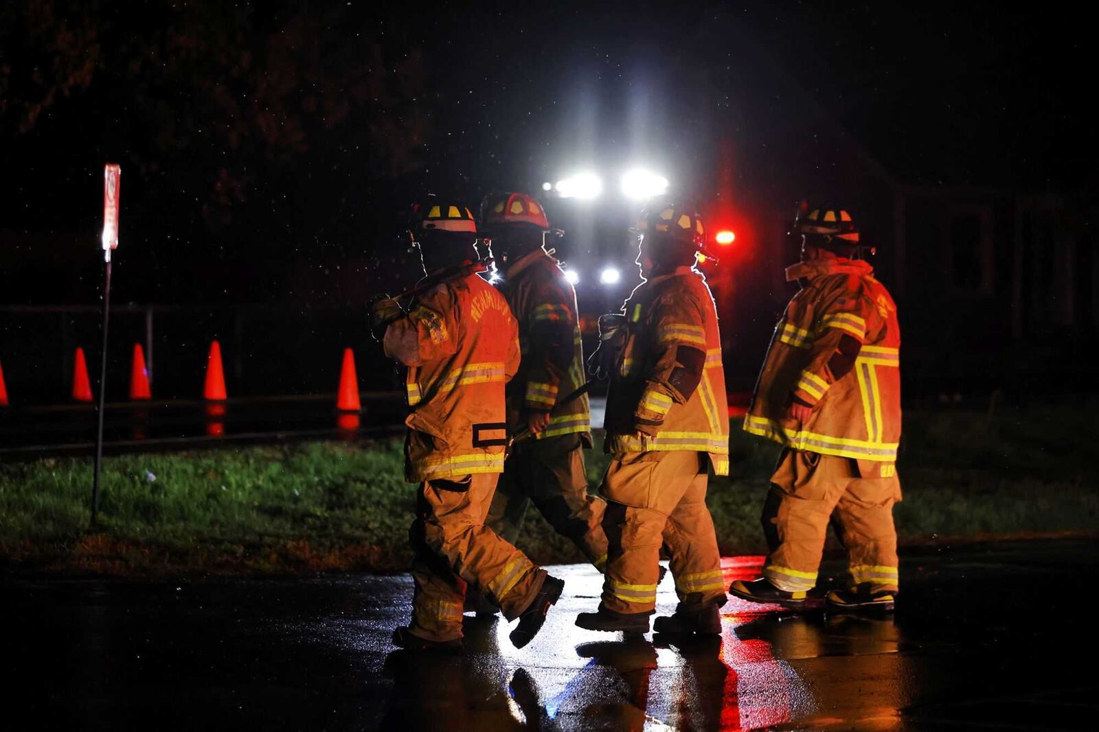 First responders arrive at Trenton Road in St. Clair Township on Sunday night, March 30, 2025, where a tree was down over the road after strong thunderstorms. Crews were checking for possible damage to trailers in a mobile home community there. NICK GRAHAM / STAFF
