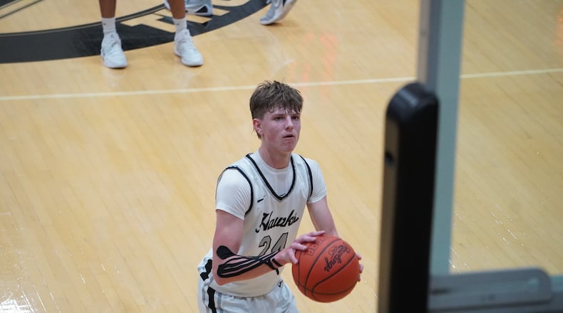 Lakota East’s Brody Hayes takes aim at the rim during a free throw attempt against Hamilton on Friday, Dec. 19, 2025 at Lakota East High School. CHRIS VOGT / CONTRIBUTED