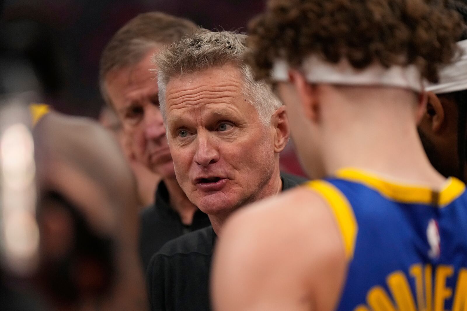Golden State Warriors head coach Steve Kerr talks to his team during the first half of Game 1 of an NBA basketball first-round playoff series against the Houston Rockets in Houston, Sunday, April 20, 2025. (AP Photo/Ashley Landis)
