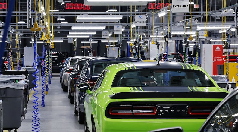 Cars go through a 150-point inspection before they're listed for sale on-line by Carvana. The Trenton company that recently opened is looking to hire about 900 employees so it can operate fully. NICK GRAHAM/STAFF