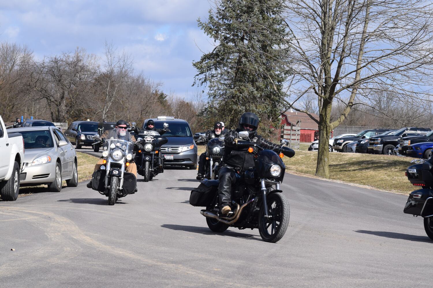 PHOTOS: Thousands of Outlaws attend motorcycle gang leaders funeral at Montgomery County Fairgrounds.