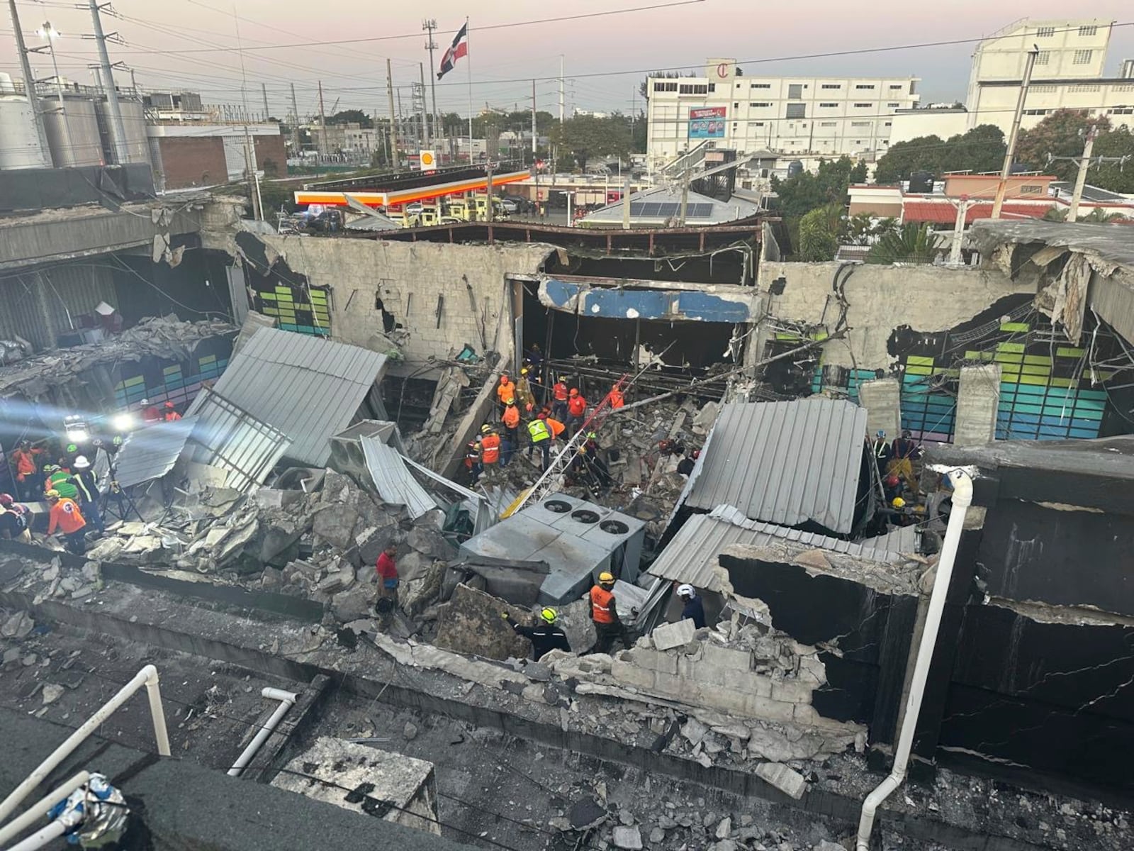 Rescue workers search for survivors at the Jet Set nightclub after its roof collapsed during a concert in Santo Domingo, Dominican Republic, early Tuesday, April 8, 2025. (Noticias SIN via AP)
