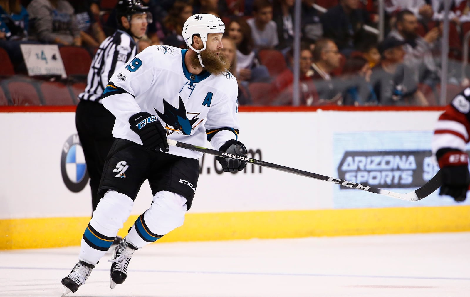FILE - San Jose Sharks center Joe Thornton (19) skates to the puck during the first period of an NHL hockey game against the Arizona Coyotes on Nov. 22, 2017, in Glendale, Ariz. (AP Photo/Ross D. Franklin, File)