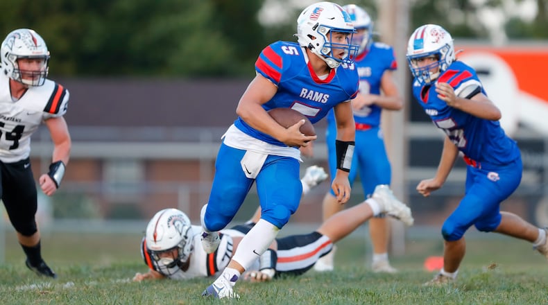 Greeneview High School senior Alex Horney runs the ball during their game against Waynesville on Thursday night at Don Nock Field in Jamestown. Horney rushed for a career-high 232 yards and four TDs as the Rams won 40-28. Michael Cooper/CONTRIBUTED