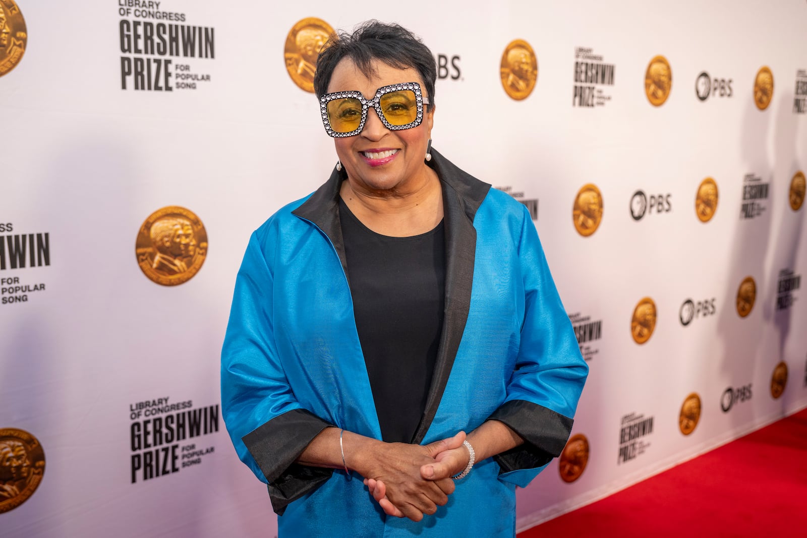 FILE - Librarian of Congress Carla Hayden arrives on the red carpet for the 2024 Library of Congress Gershwin Prize for Popular Song honoring Elton John and Bernie Taupin at DAR Constitution Hall March 20, 2024, in Washington. (AP Photo/Kevin Wolf, File)