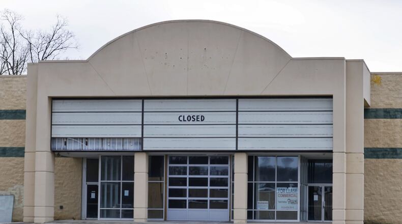 Todd Helton has announced Shooters Sports Grill will occupy part of the former 10-screen Danbarry movie theater on NW Washington Boulevard in Hamilton, as well as an unnamed steakhouse, and possibly a banquet area and entertainment venue in the 24,000 sq. ft. building. NICK GRAHAM/ STAFF