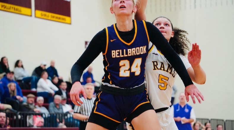 Bellbrook senior Izella Painter (24) boxes out Ross junior Kelis Egodotaye (5) on Thursday night at Ross High School. Chris Vogt/CONTRIBUTED