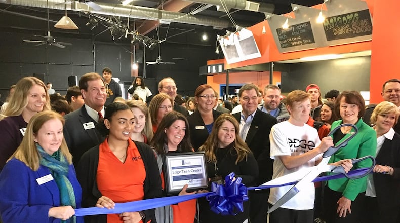 Officials from the Edge Teen Center, which just celebrated a decade of serving students from Lakota Schools, has announced it will expand to add its first satellite center to open by the start of next school year. The current center, which is located adjacent to the Lakota East High School campus in Liberty Township, will open a center in August near Lakota West Freshman School in West Chester Township. Pictured are center officials joined by Lakota officials, state legislators and West Chester Liberty Chamber Alliance officials at this week’s 10-year anniversary celebration.