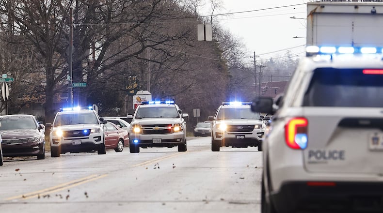 Multiple Middletown police officers are searching on Tytus Avenue this morning for a suspect. NICK GRAHAM/STAFF