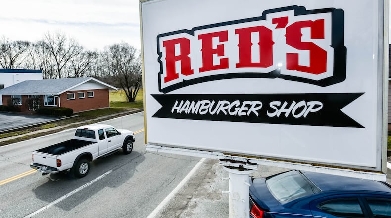 Red's Hamburger Shop at 103 S. Riverside Drive in New Miami reopened in February under new owners Craig and Yolanda Beuerlein. NICK GRAHAM / STAFF