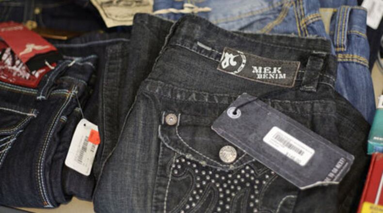 A Butler County woman is slated to be arraigned in Middletown Municipal Court on a petty theft charge after it was discovered she removed the security devices from clothing.