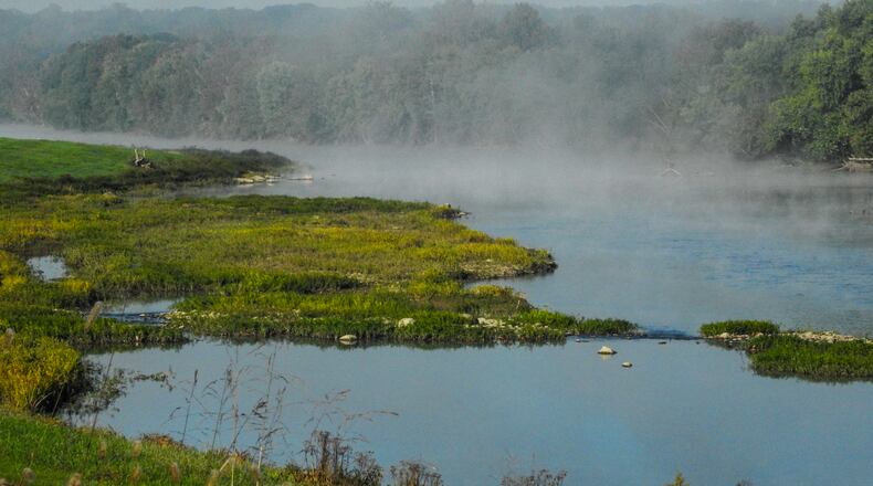 Early morning fog is visible along the Great Miami River in Middletown. NICK GRAHAM/STAFF