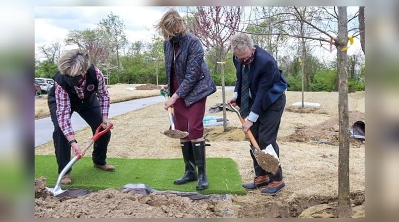 Ohio Gov. Mike DeWine and Ohio Department of Natural Resources Director Mary Mertz dedicated a new memorial tree grove Friday, April 30, 2021, in honor of the victims and survivors of COVID-19 as well as all Ohioans who made personal sacrifices to protect others amid the coronavirus pandemic. During the ceremony, DeWine, first lady Fran DeWine and Mertz planted the first tree in the new grove. CONTRIBUTED