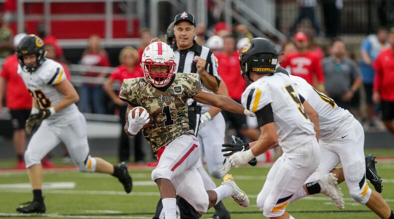 Fairfield’s Jutahn McClain carries the ball during their season opener football game against Centerville Friday, August 30 in Fairfield. Farifield won 33-7. NICK GRAHAM/STAFF
