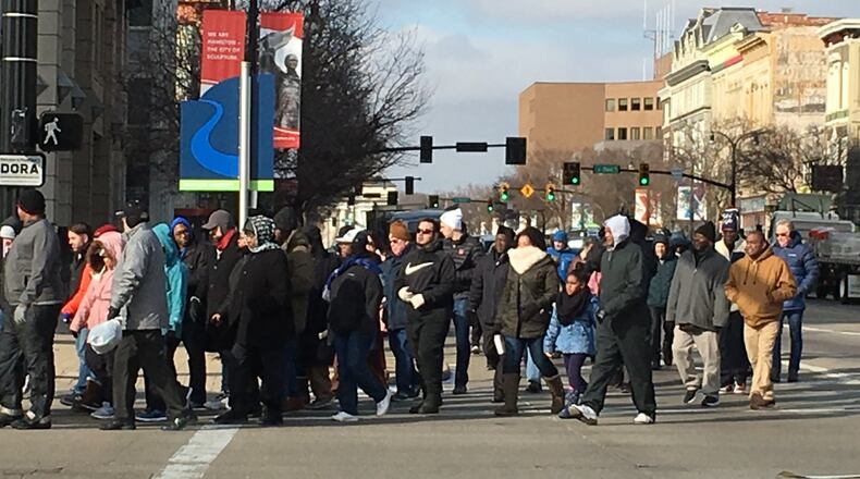 FILE: About 50 people braved cold temperatures for the 34th annual Martin Luther King, Jr. event in 2020 in Hamilton. The march stepped off from the Booker T. Washington Community Center on Front Street, traversed High Street and then down MLK Boulevard to the Pilgrim Baptist Church.