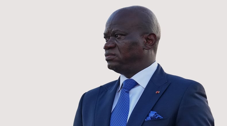 FILE - Gabon's President Brice Oligui Nguema waits to welcome France's President Emmanuel Macron at the Leon-Mba International Airport in Libreville, Gabon, Sunday, Nov. 23, 2025. (AP Photo/Thibault Camus, file)